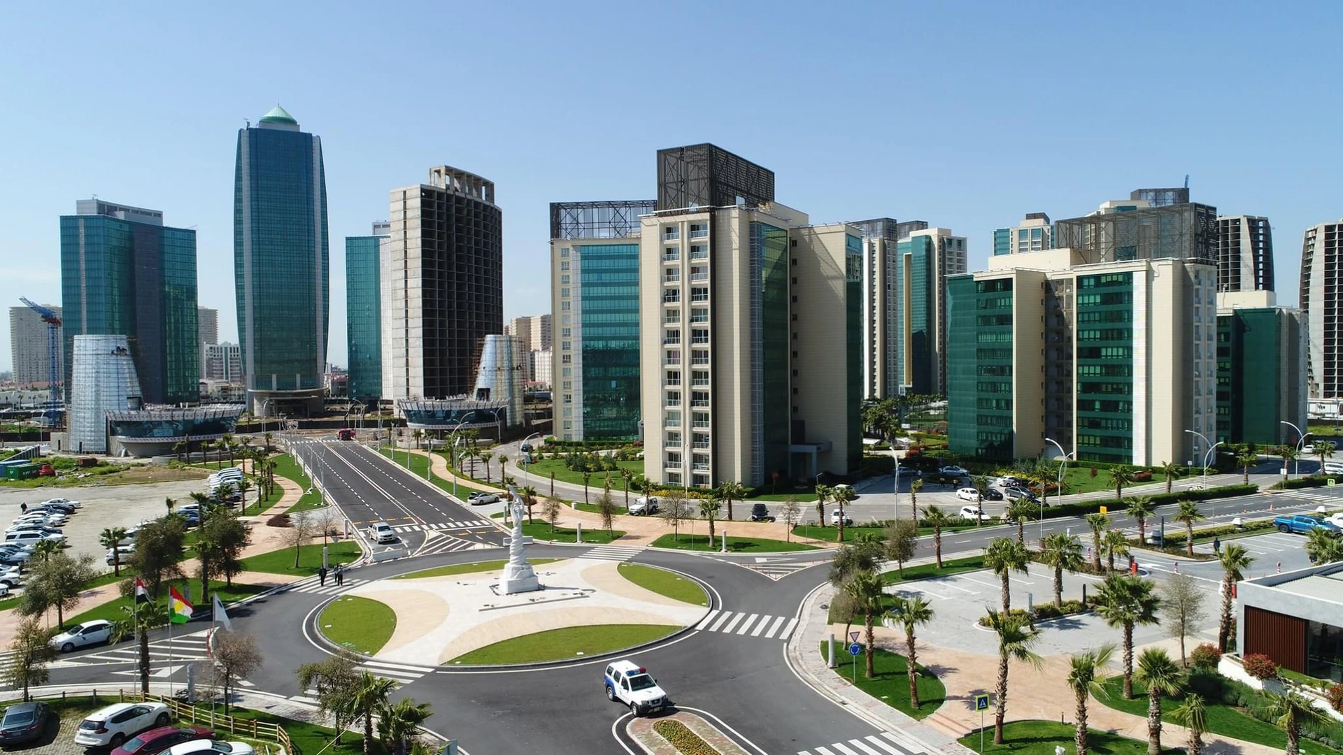 Modern towers, landscaped streets and roundabout in the Empire World business district of Erbil